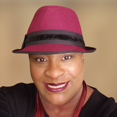 vicki-in-the-burgundy-hat-brown-background